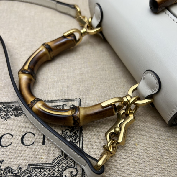 G*u*i mini top handle bag with bamboo